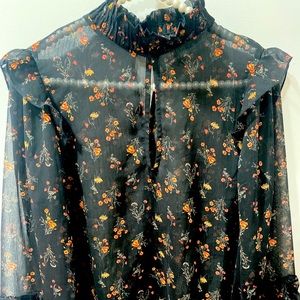 Floral blouse ruffled detail